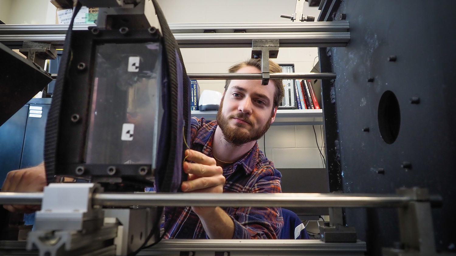 A student works on a project in an engineering lab